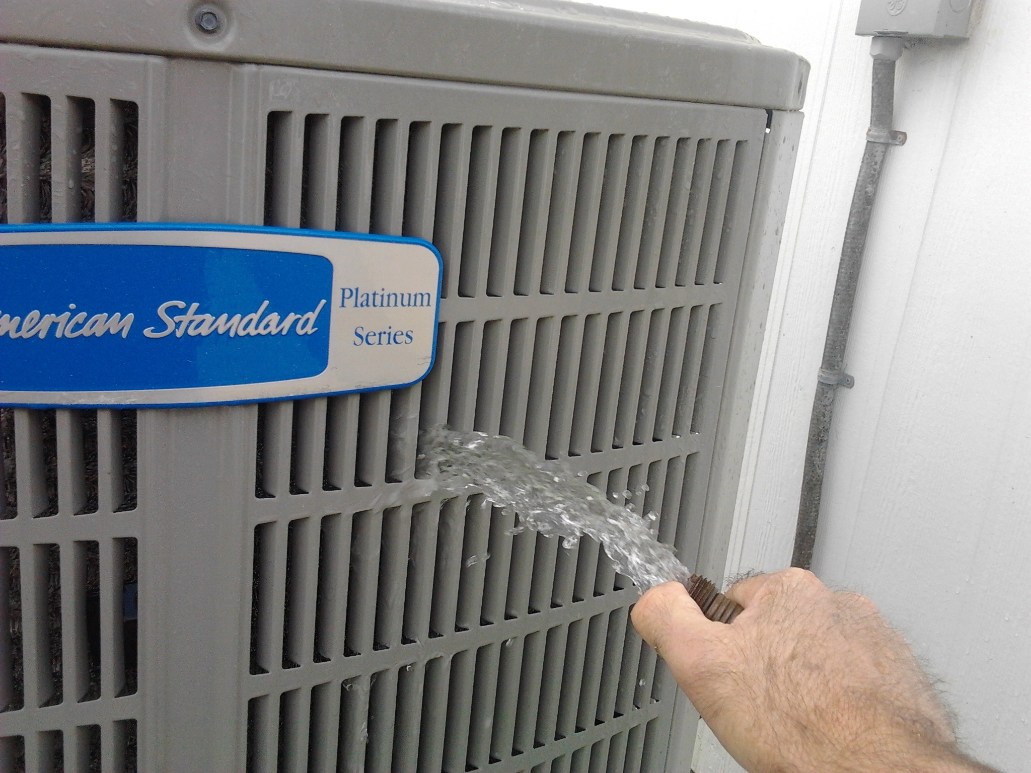 Cleaning AIr Conditioning Condenser AC Repair League City TX